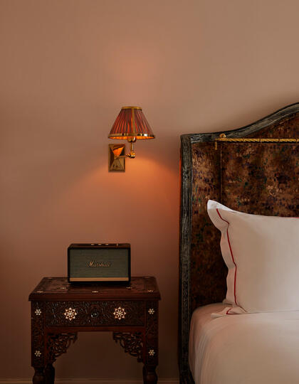 The bed in a guest room at NYC's Hotel Chelsea
